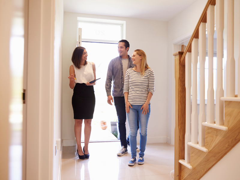 Realtor showing couple a home